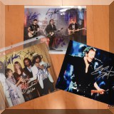 C30. Autographed Fleetwood Mac, U2 and Bruce Springsteen photographs. 